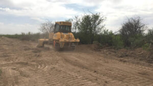 heavy machinery clearing a right of way