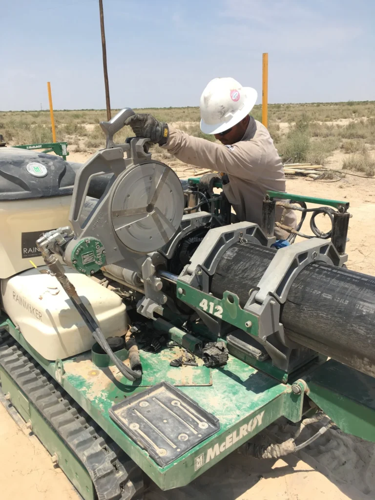 worker on an hdpe pipeline construction projec